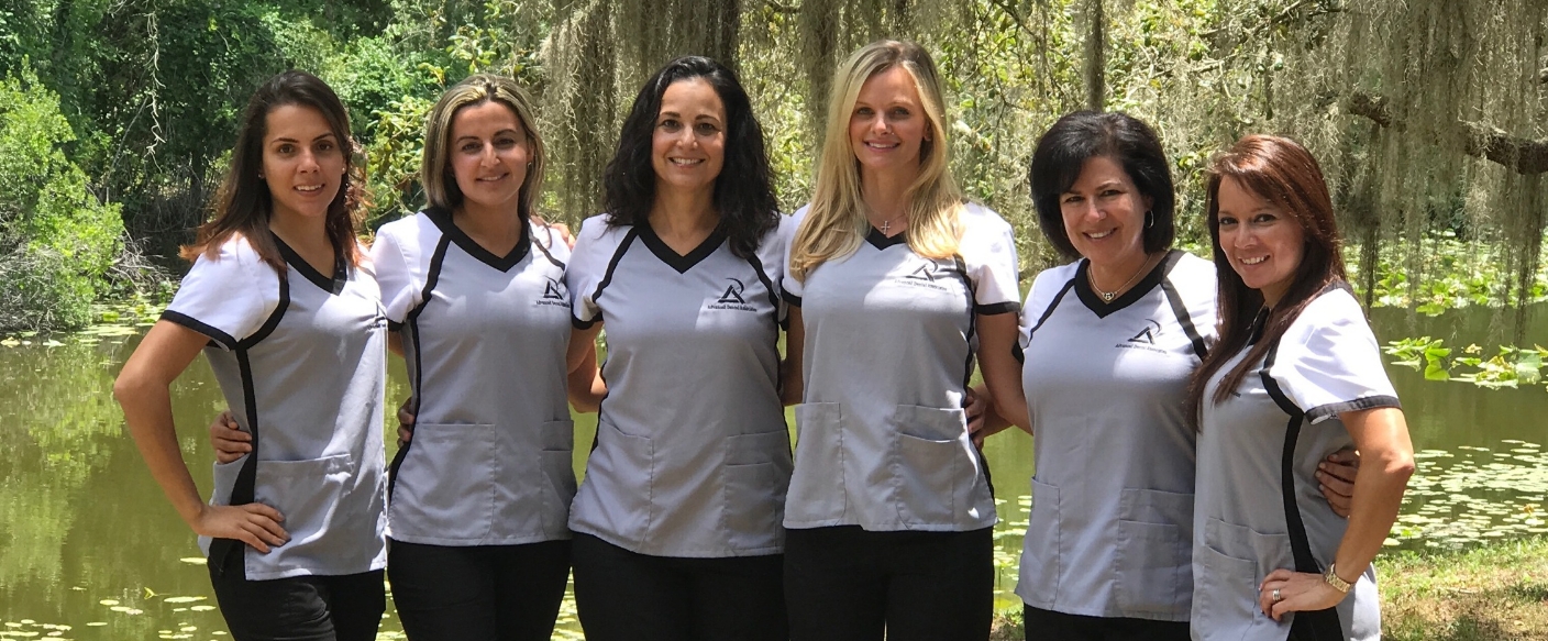 Smiling Tampa dental team members at Florida Digital Implants