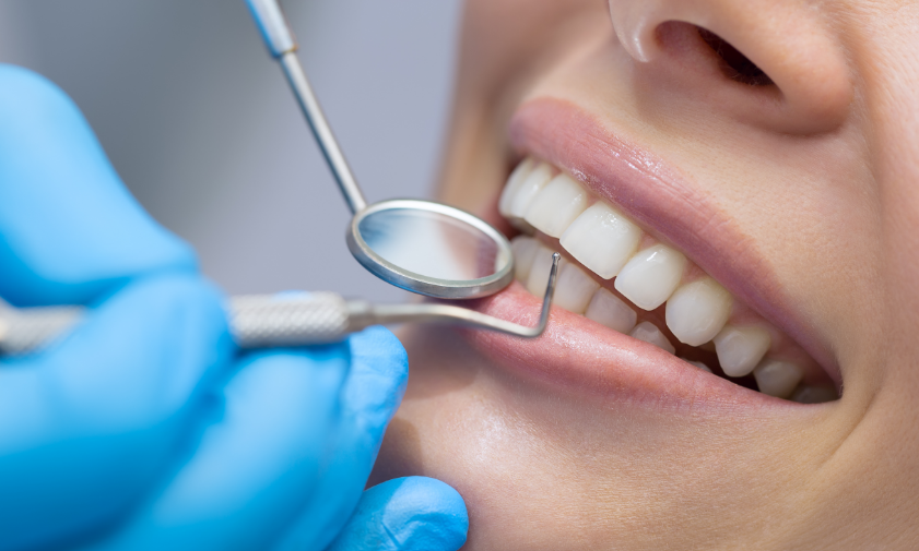 Patient smiling during dental exam