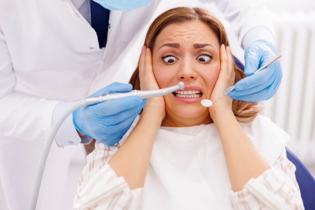 A woman who is afraid of the dentist
